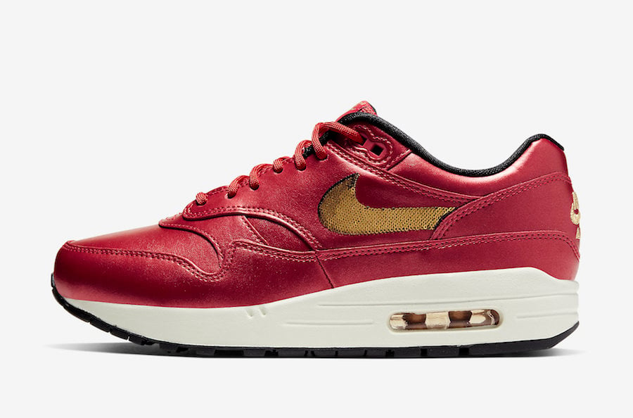 gold and red nike air max