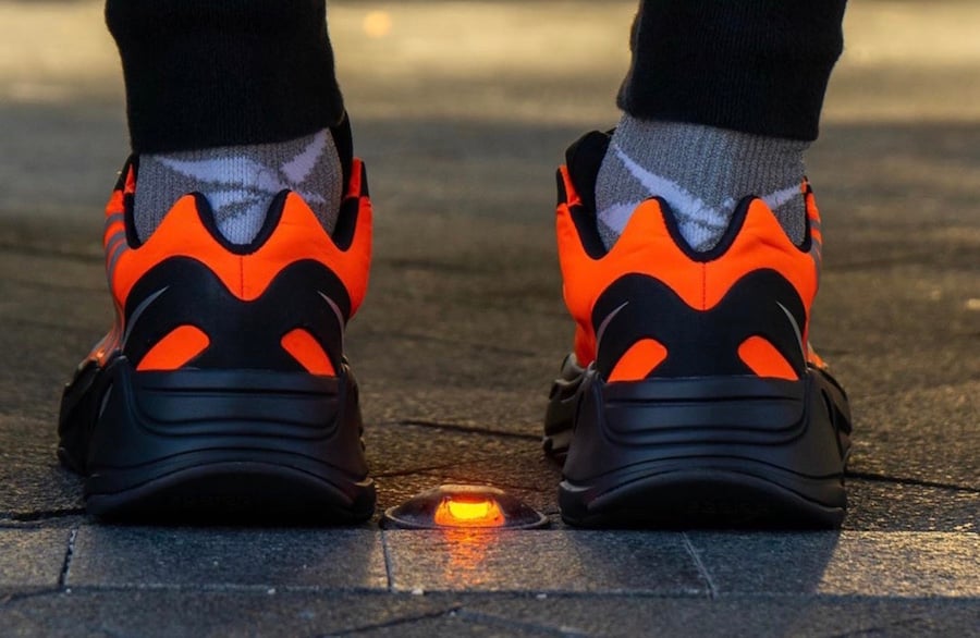 orange black yeezy 700