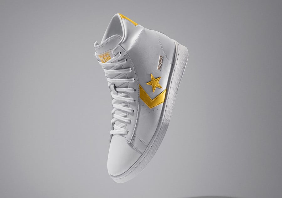 white and yellow converse