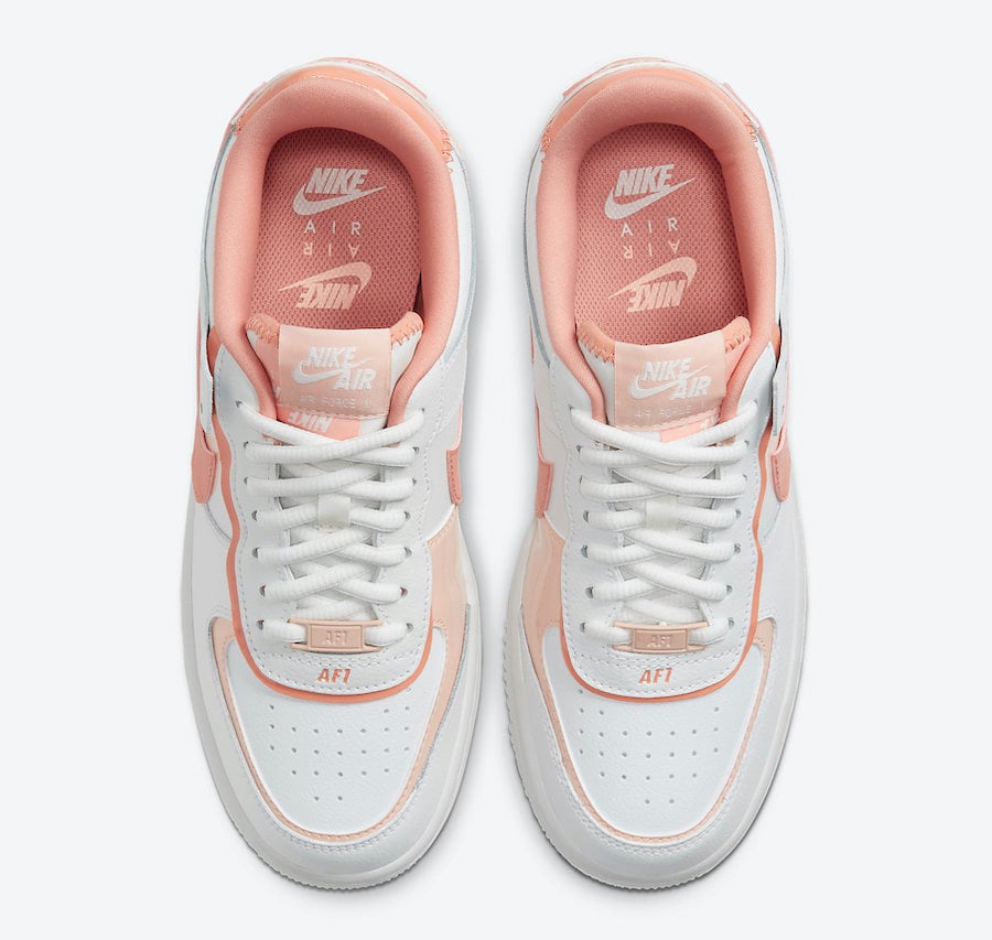 pastel pink white and grey nike sneakers