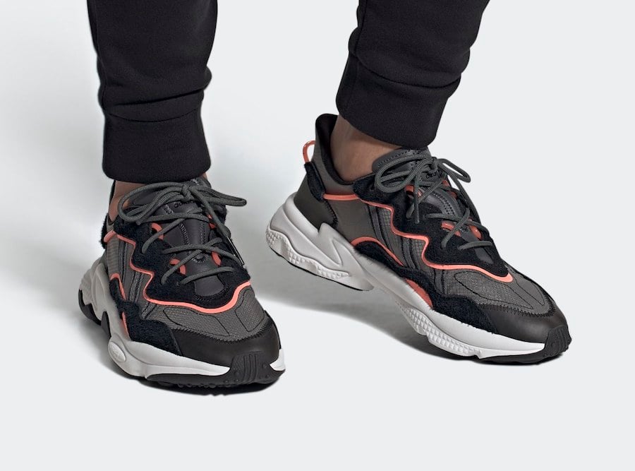This adidas Ozweego Features Coral Accents