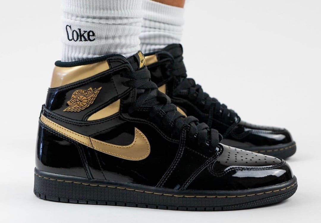 women's black and gold jordans