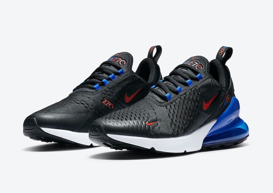 black nike with blue swoosh