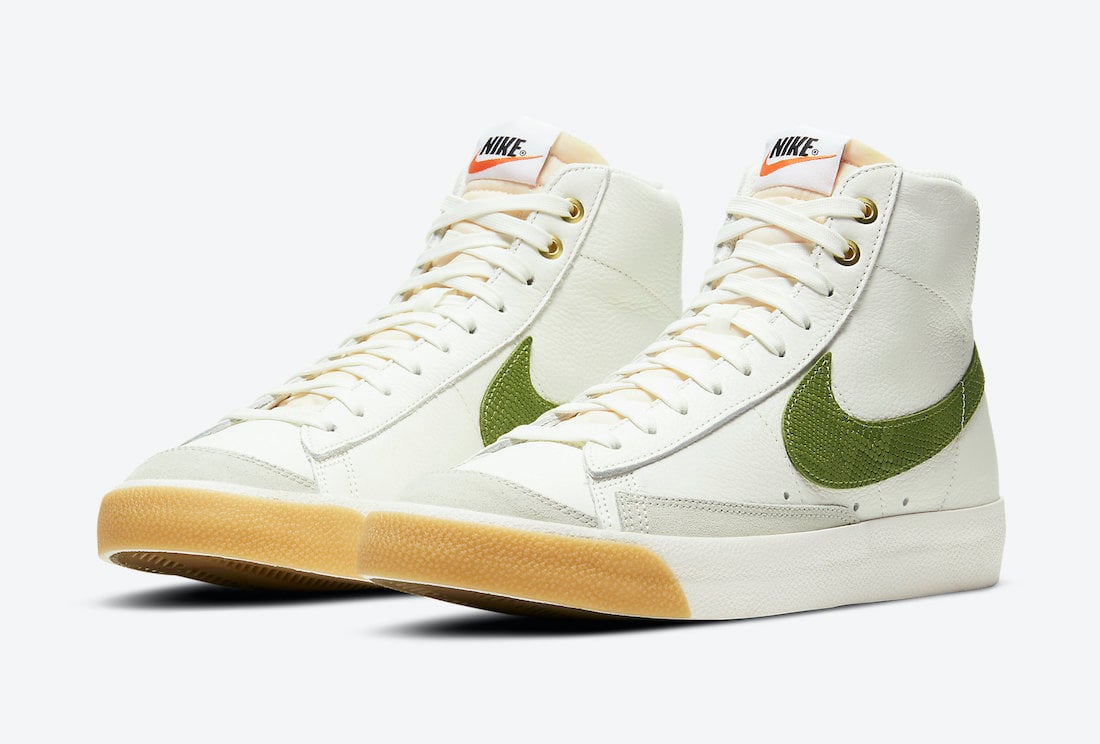 white nike shoes with green swoosh