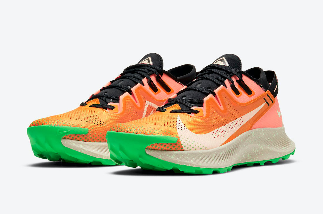 orange and green nike shoes