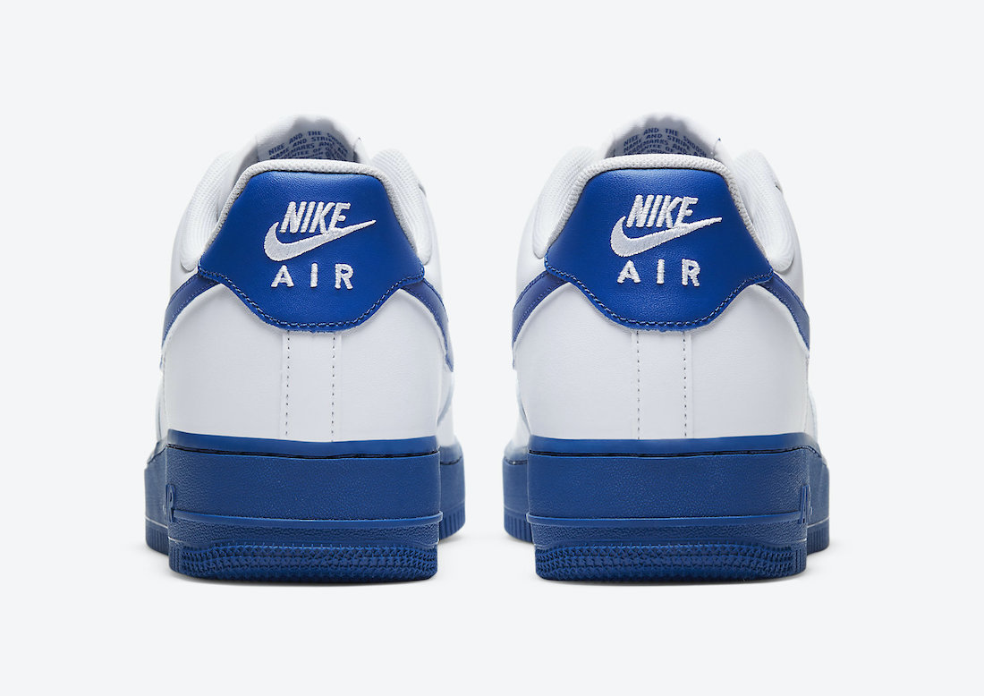 white and royal blue nike shoes