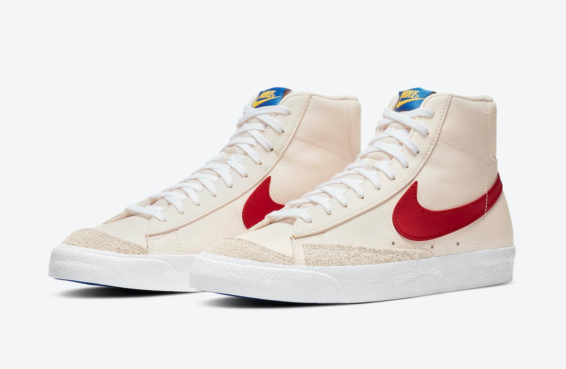 Nike Blazer Mid with a Cream Upper, Red Swoosh and Blue Soles