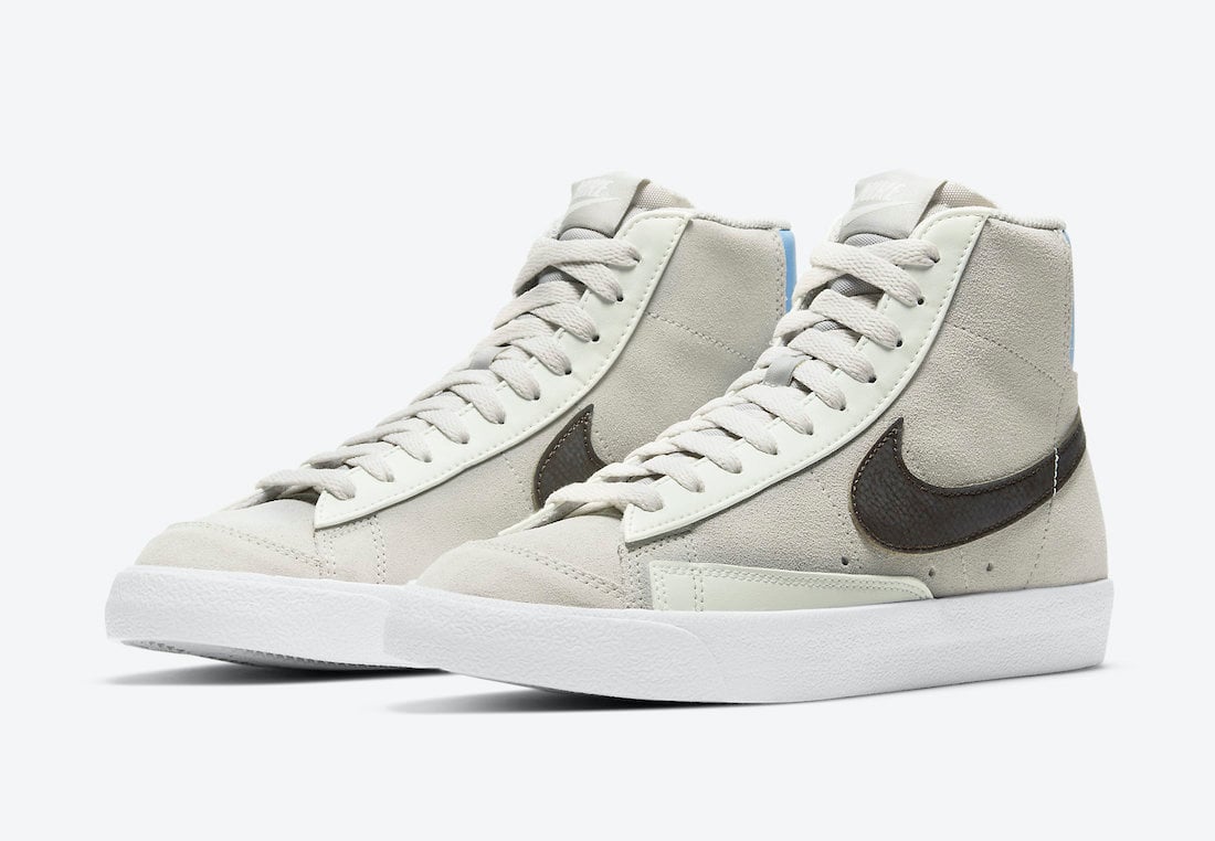 This Nike Blazer Mid Features Grey Suede and Light Blue