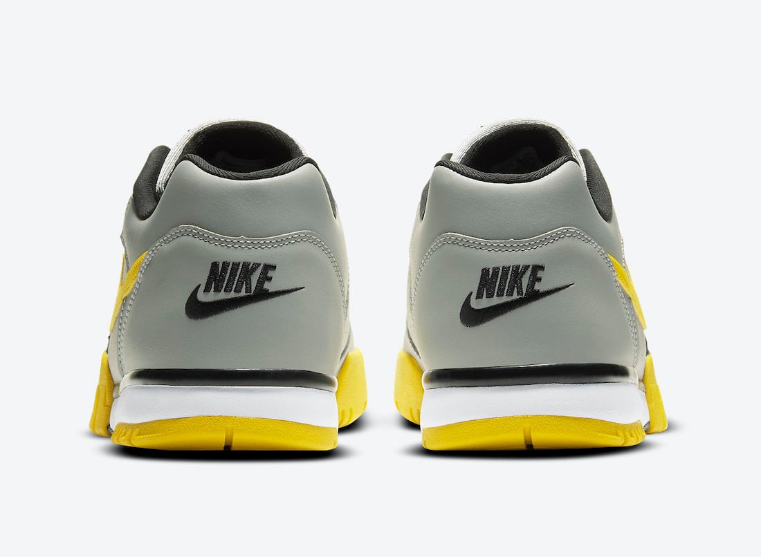 gray and yellow nike shoes