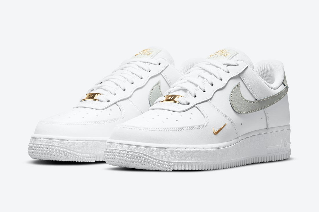 gold and white air force ones