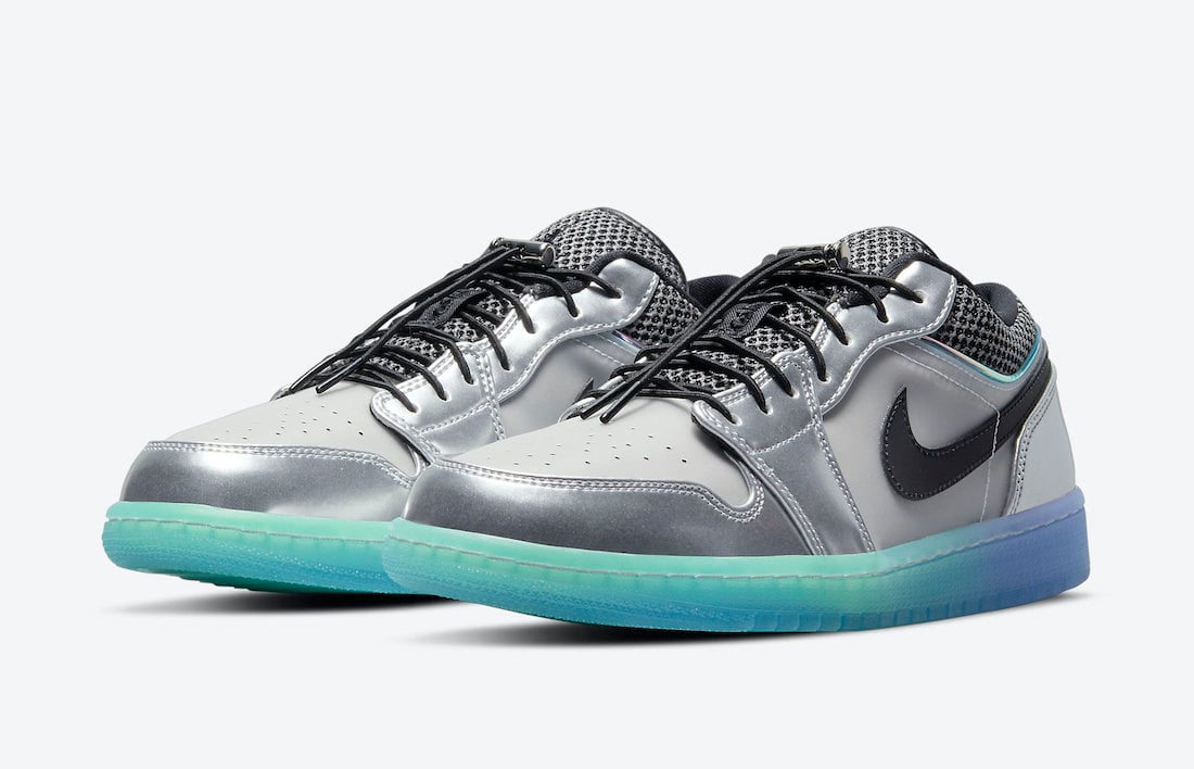 This Air Jordan 1 Low Features Metallic Silver and Gradient Soles