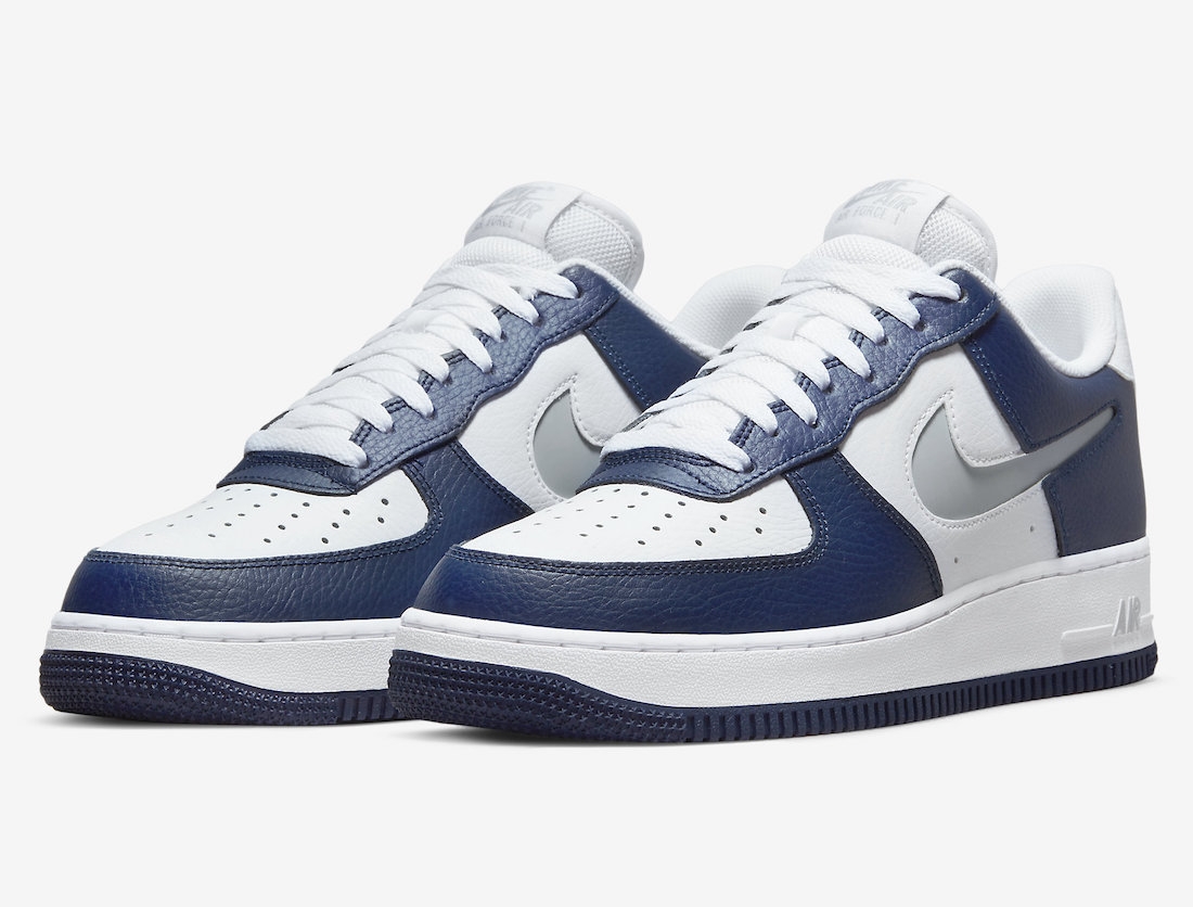 Nike Air Force 1 Low in White and Navy with Cut-Out Swooshes