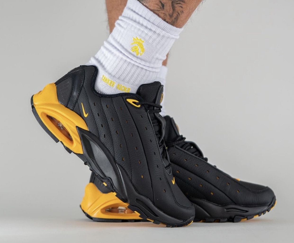 NOCTA Nike Hot Step Air Terra Black University Gold DH4692-002 On-Feet