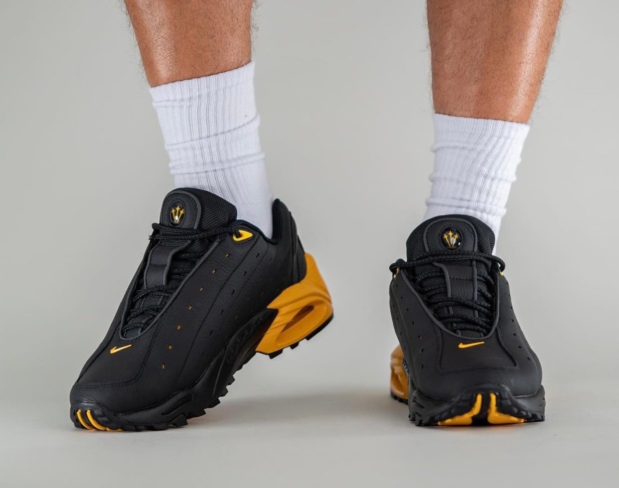 NOCTA Nike Hot Step Air Terra Black University Gold DH4692-002 On-Feet