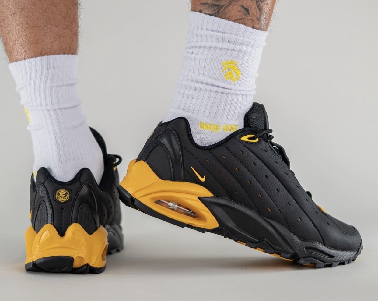 NOCTA Nike Hot Step Air Terra Black University Gold DH4692-002 On-Feet