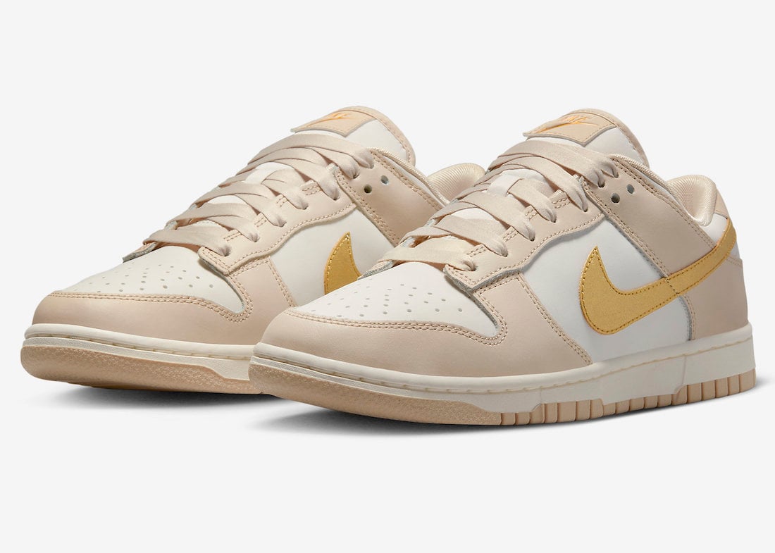 This Nike Dunk Low Features Gold Swooshes