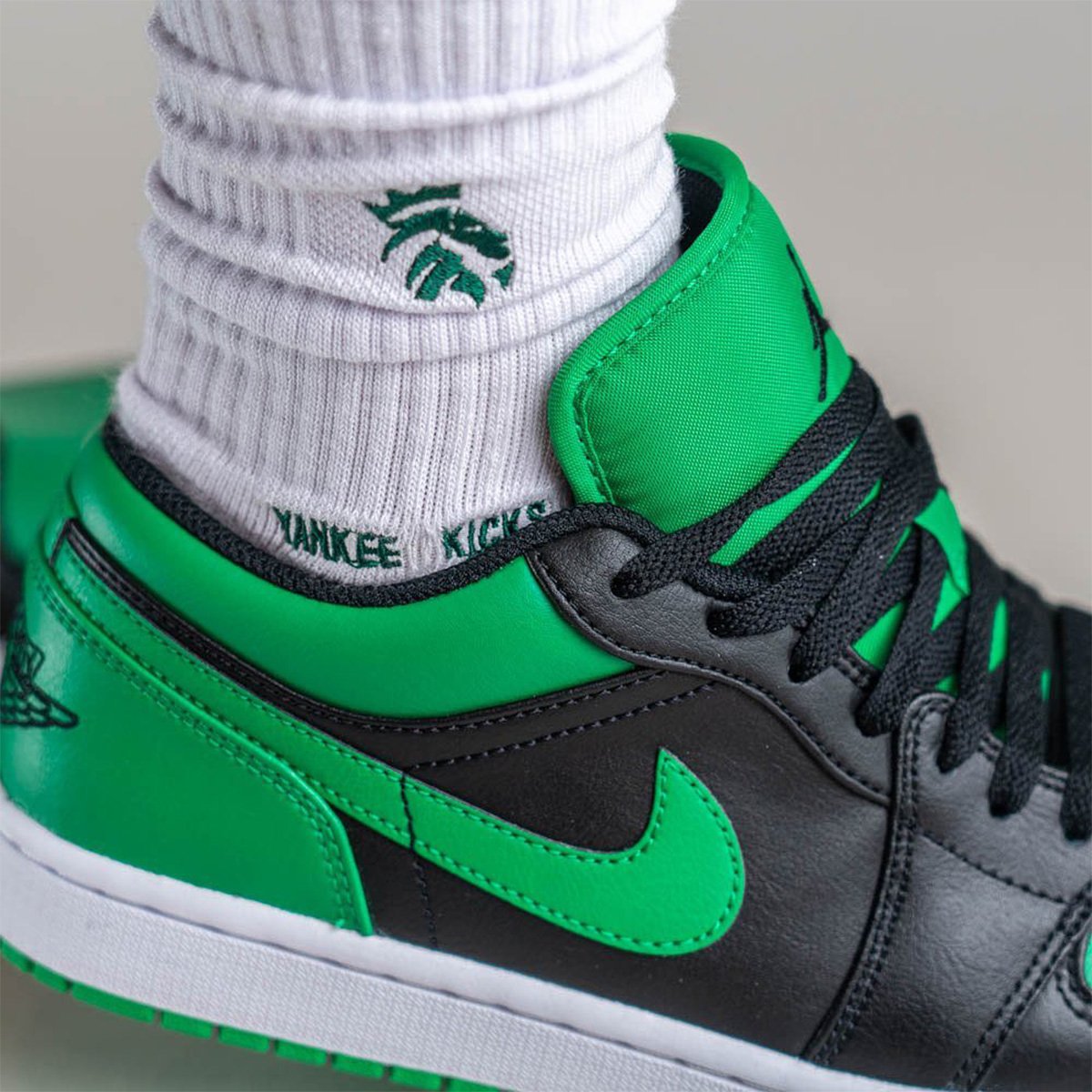 Air Jordan 1 Low Black Lucky Green 553558-065 On-Feet